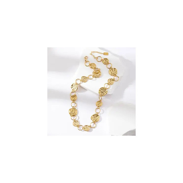 Sautoir doré avec cercles pleins et vides